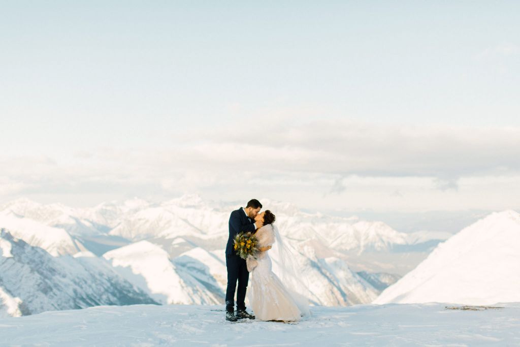 winter snow adventurous mountain elopement wedding