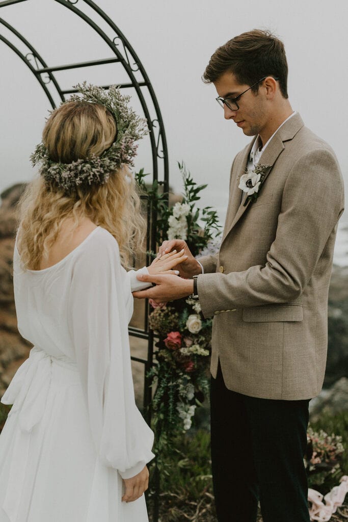 Madison + Kanyon Groom putting ring on bride during vows.