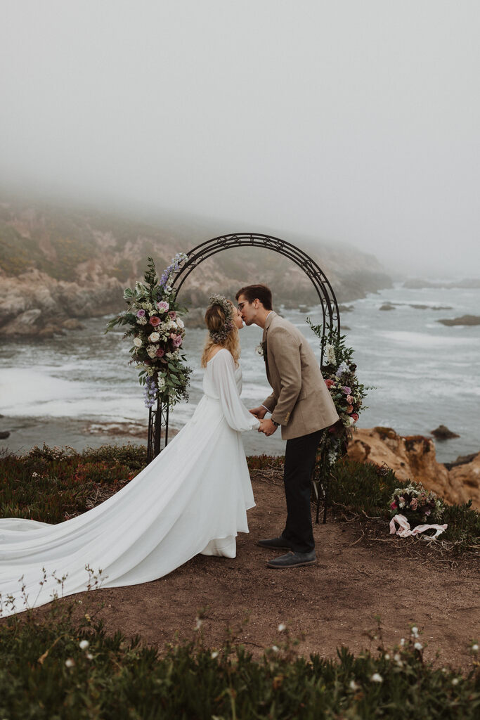 Madison + Kanyon Bride and groom exchange their first kiss as husband and wife.