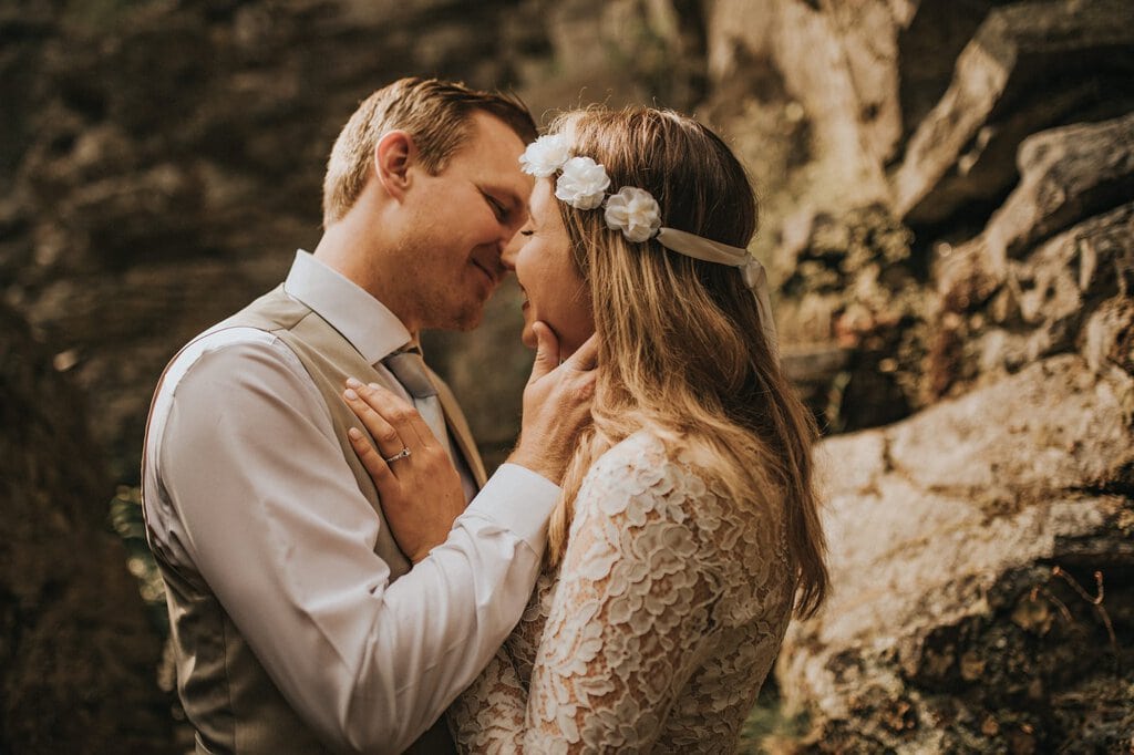 monica leavell photo linville gorge wilderness north carolina adventure elopement 018 bride and groom share a kiss.