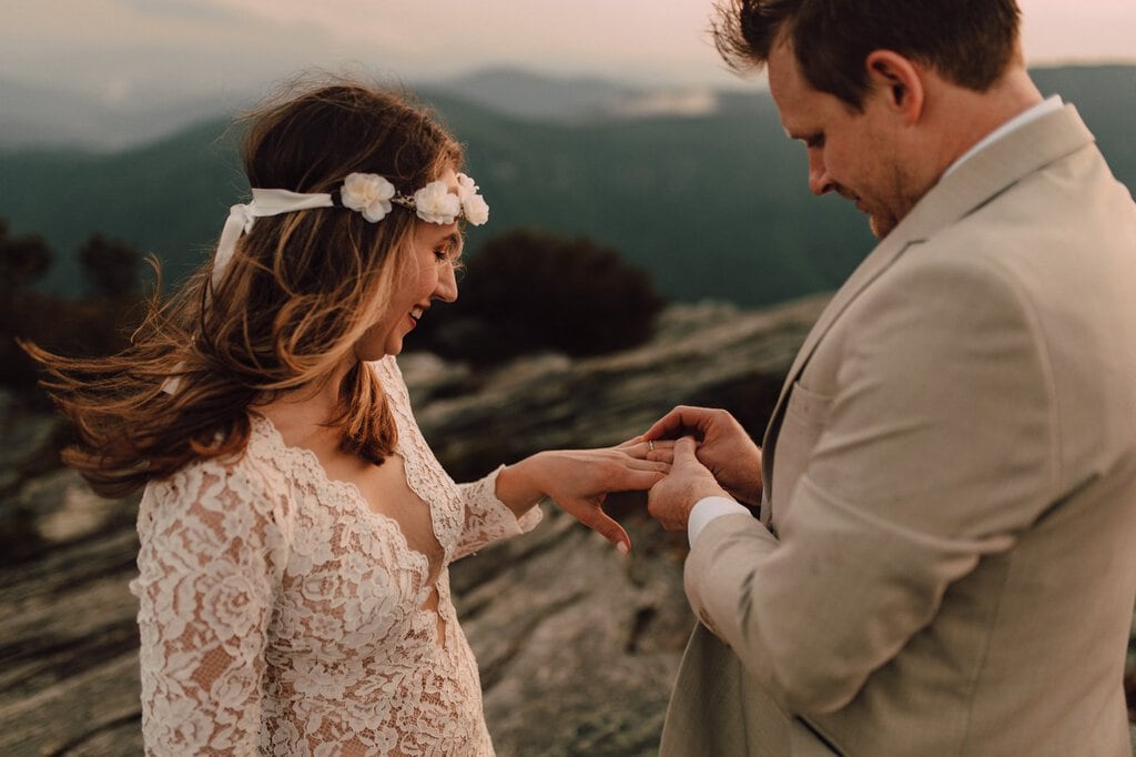 monica leavell photo linville gorge wilderness north carolina adventure elopement 035 groom puts ring on soon to be bride.