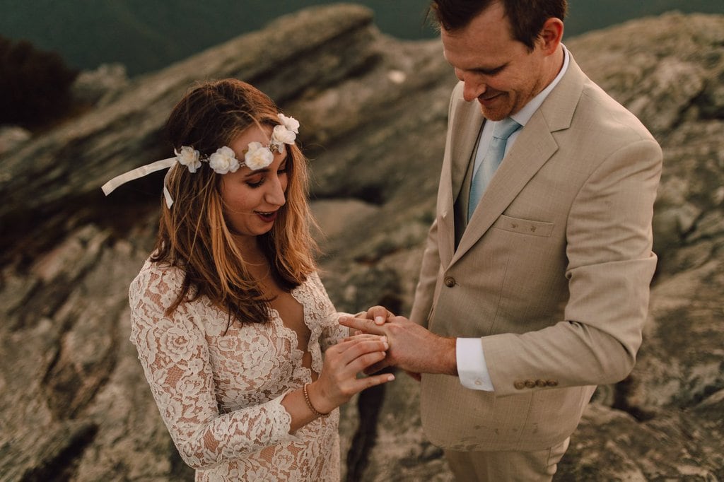 monica leavell photo linville gorge wilderness north carolina adventure elopement 036 bride puts ring on soon to be husband.