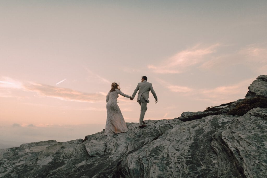 monica leavell photo linville gorge wilderness north carolina adventure elopement 038 Newlyweds hike up north Carolina mountain.