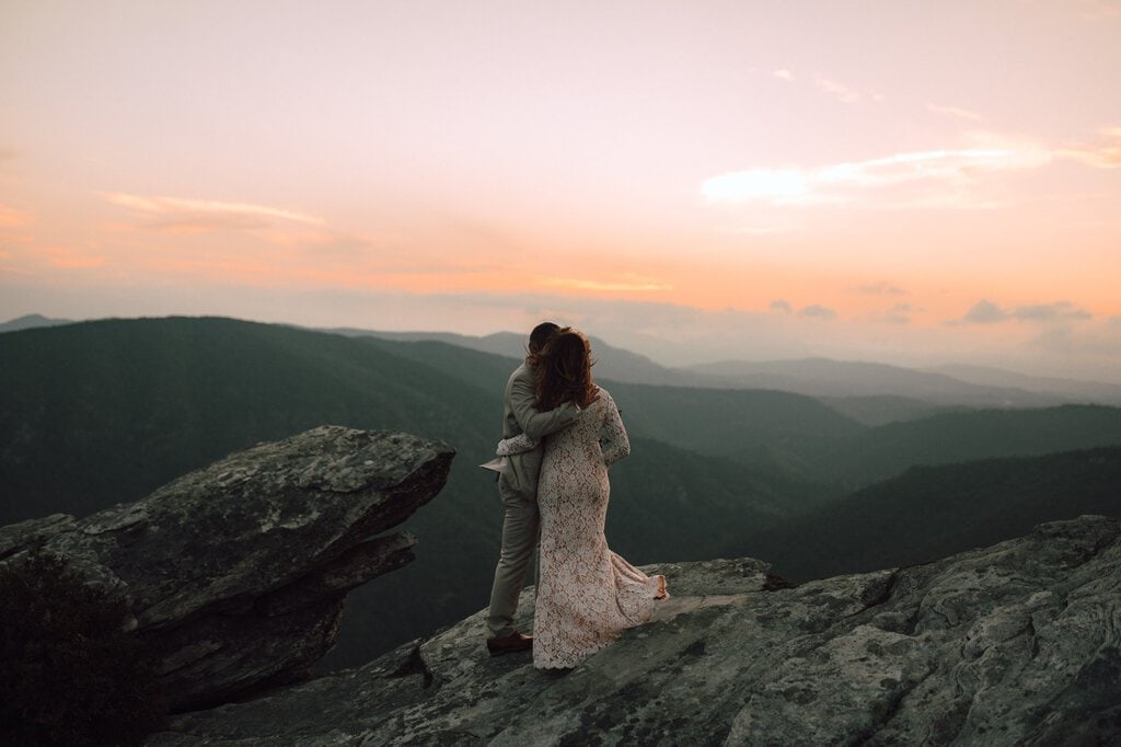 monica leavell photo linville gorge wilderness north carolina adventure elopement 049 bride and groom gaze out in north Carolina.