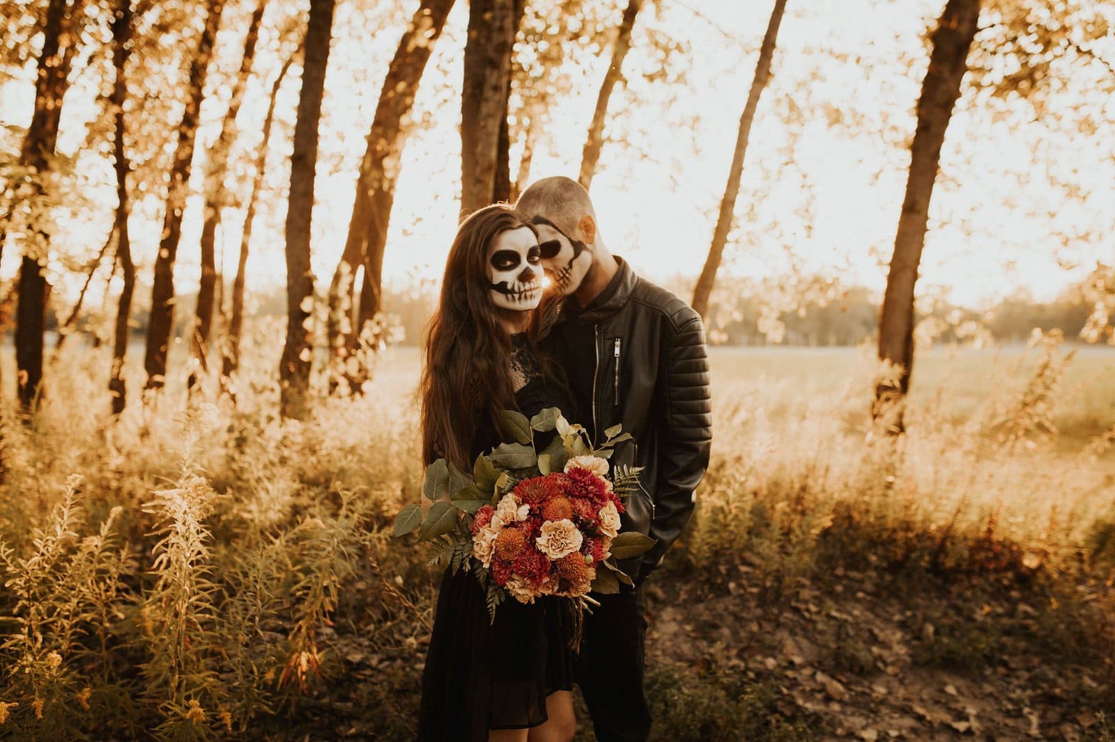 couple embracing during fall session.