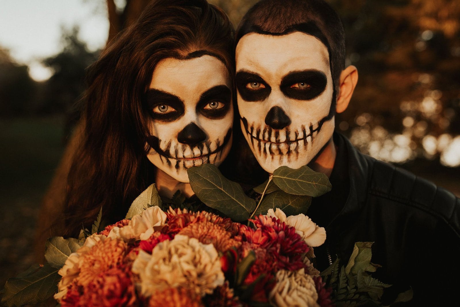 skeleton makeup on couple.