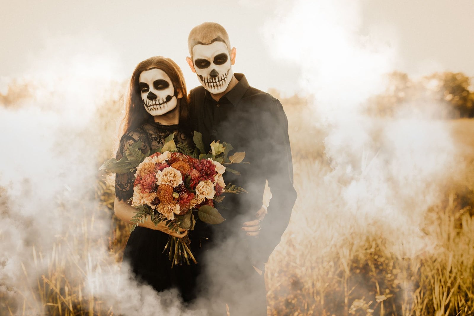 Skeleton face paint and smoke bomb for session.