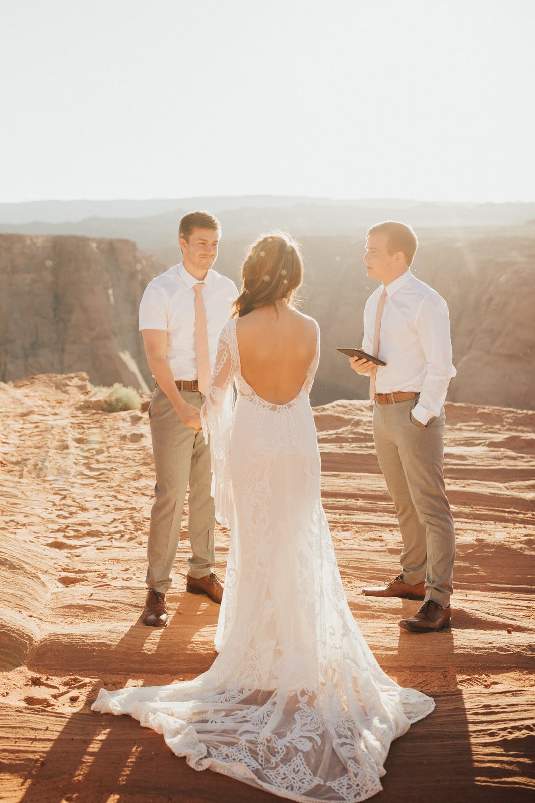 Savanna-Kaye-Horseshoe-Bend-Antelope-Canyon-Elopement_Arizona-6358 bride and groom exchange vows.