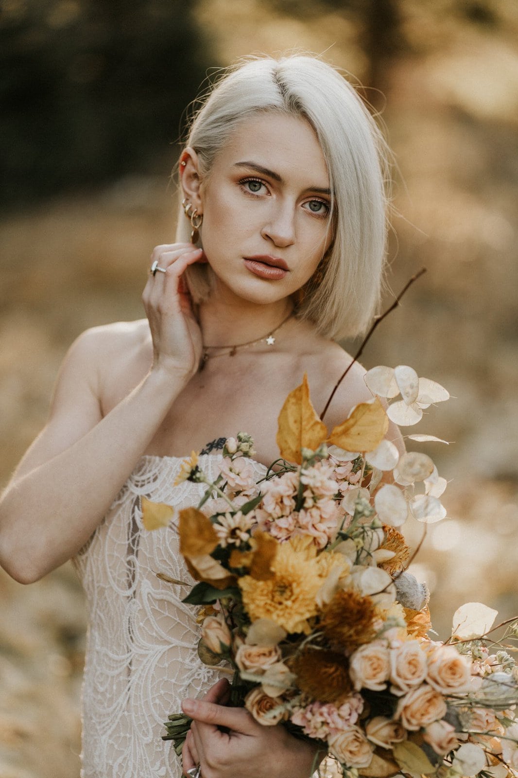 Bridal detail shot of elopement and bouquet.