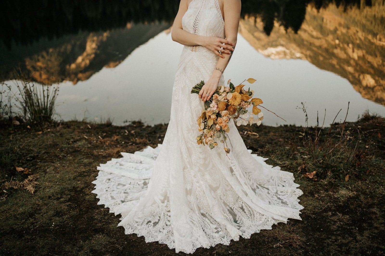 All who wander label dress with bouquet.