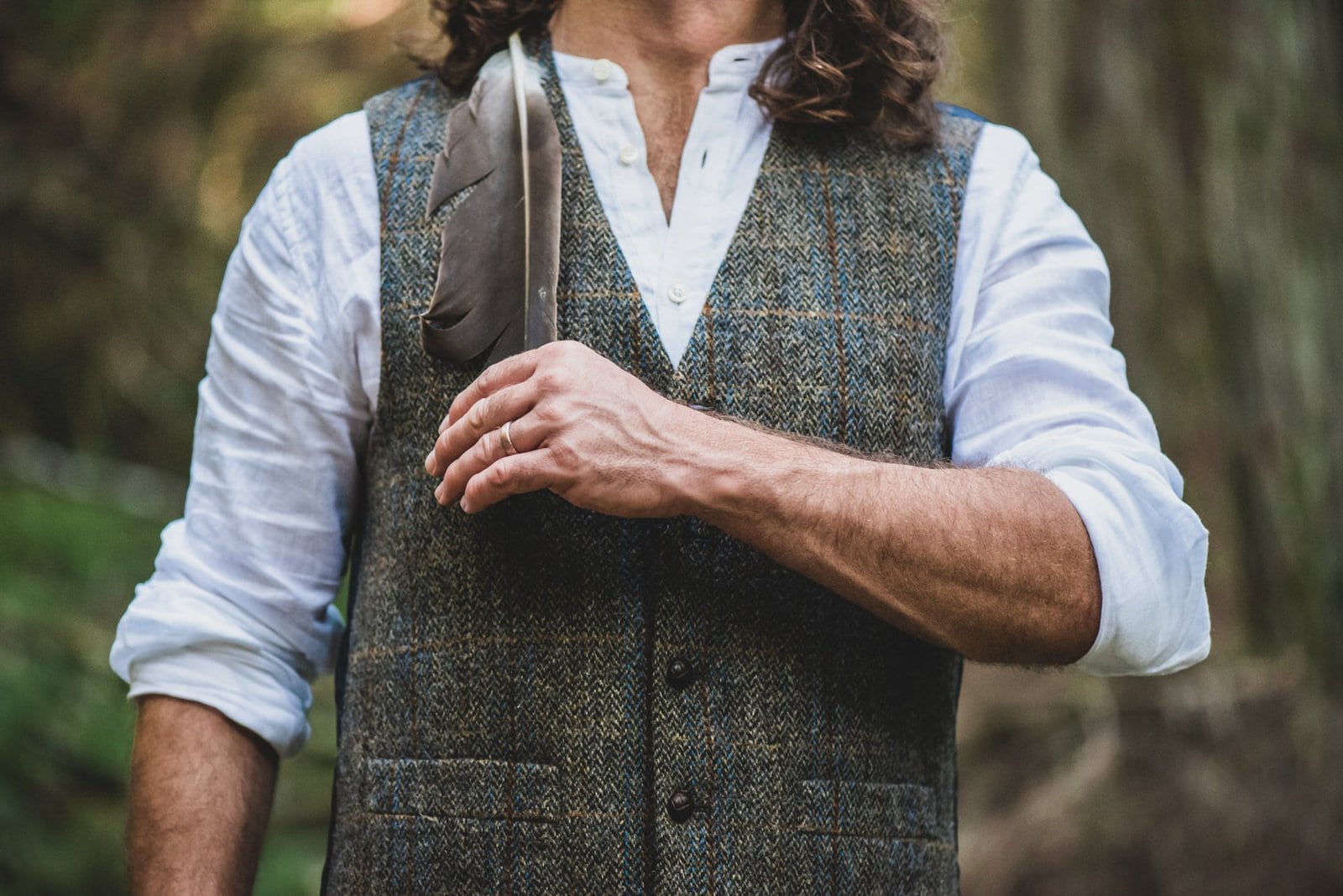 detail sot of groom outfit.