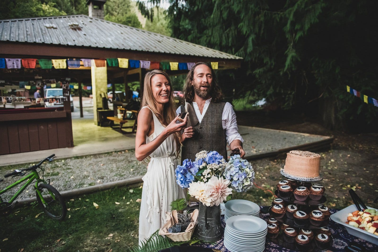 Bride and groom cut the cake