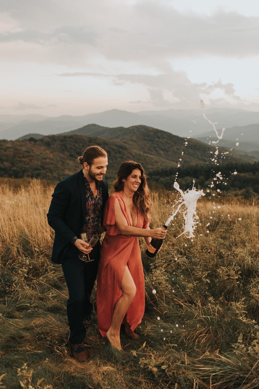 MonicaLeavell_wwwMonicaLeavellPhotocom_10-30-19 bride and groom celebrate during engagement photoshoot.