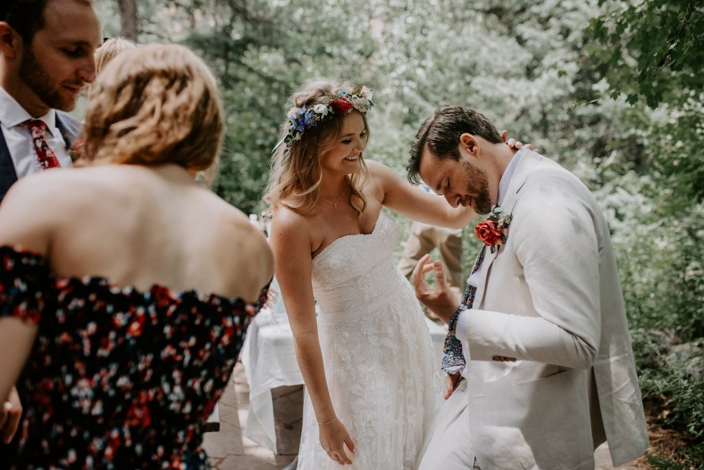 Mr. + Mrs. Doddo air guitar during elopement.