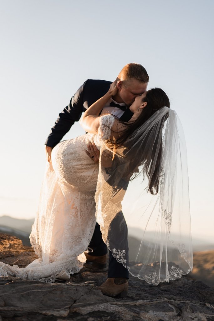 TheDrawhorns_TheDrawhorns.com_090119 Groom dips his bride during first dance.