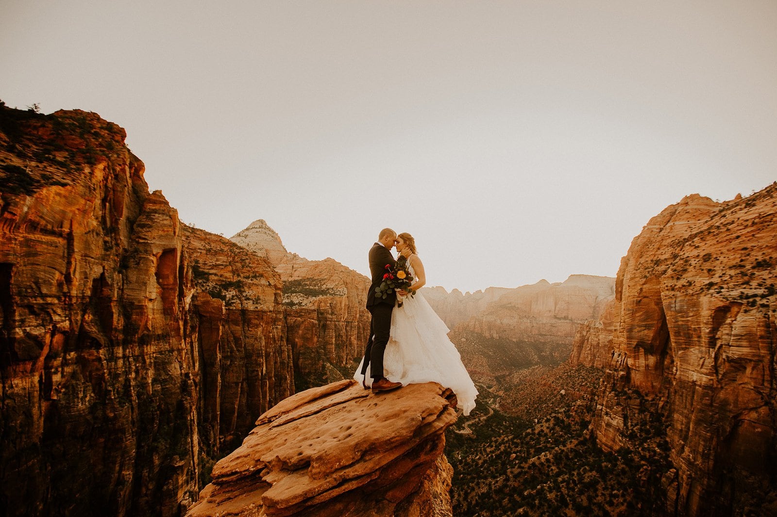 zion national park elopement photos on a rock