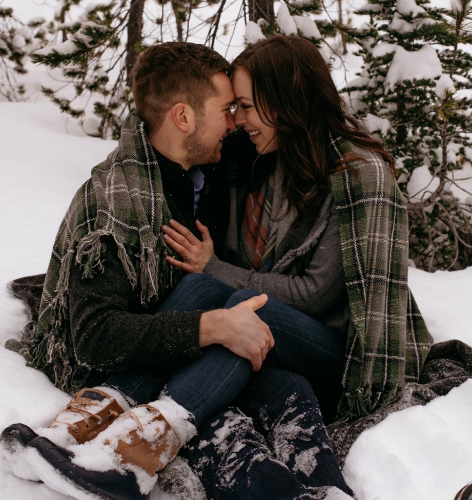 couple cuddling during winter session.