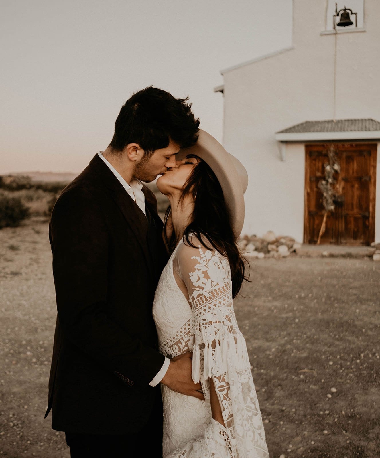 Marfa Eclectic Elopement bride and groom kiss.