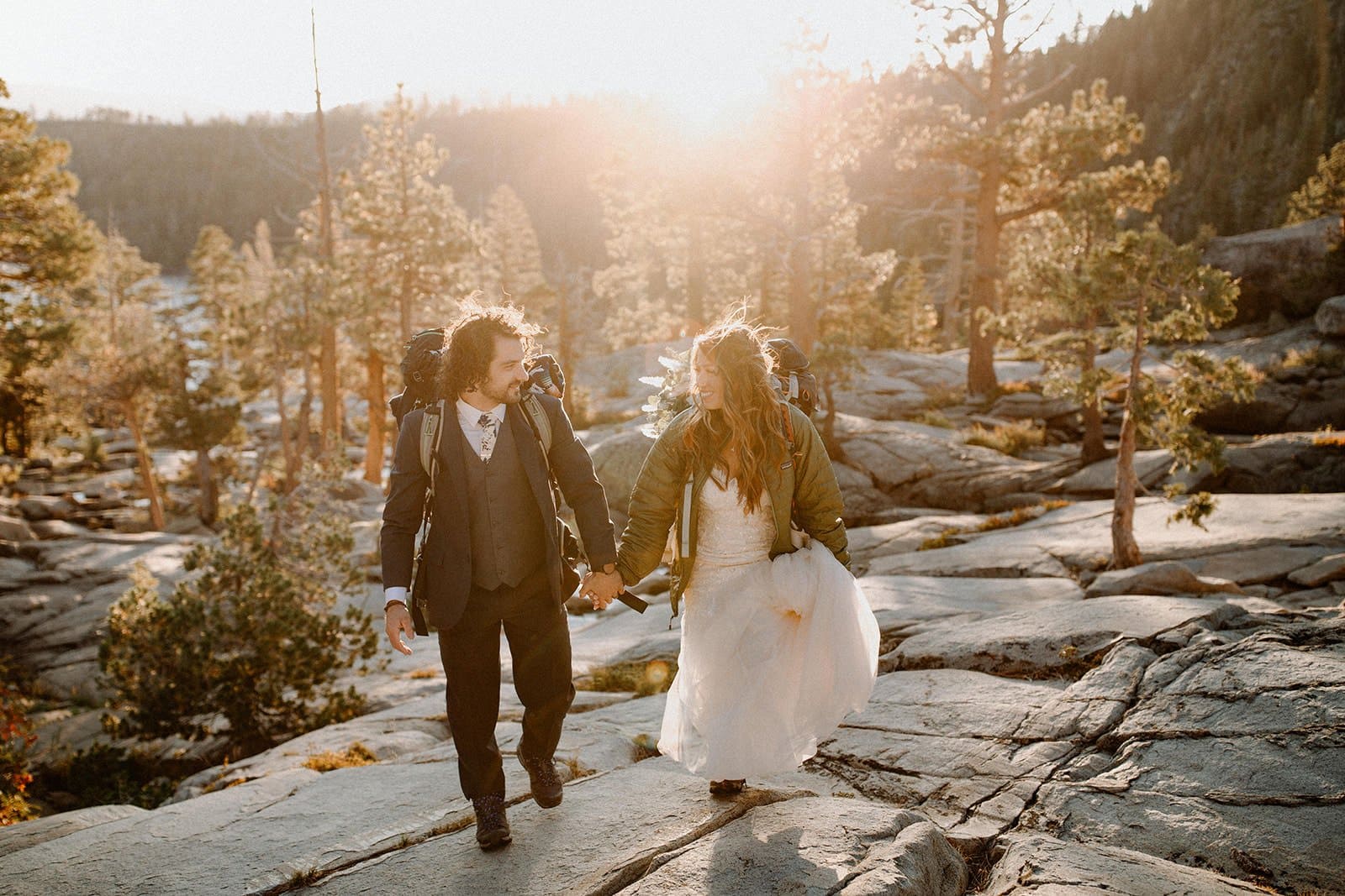 bride and groom hiking