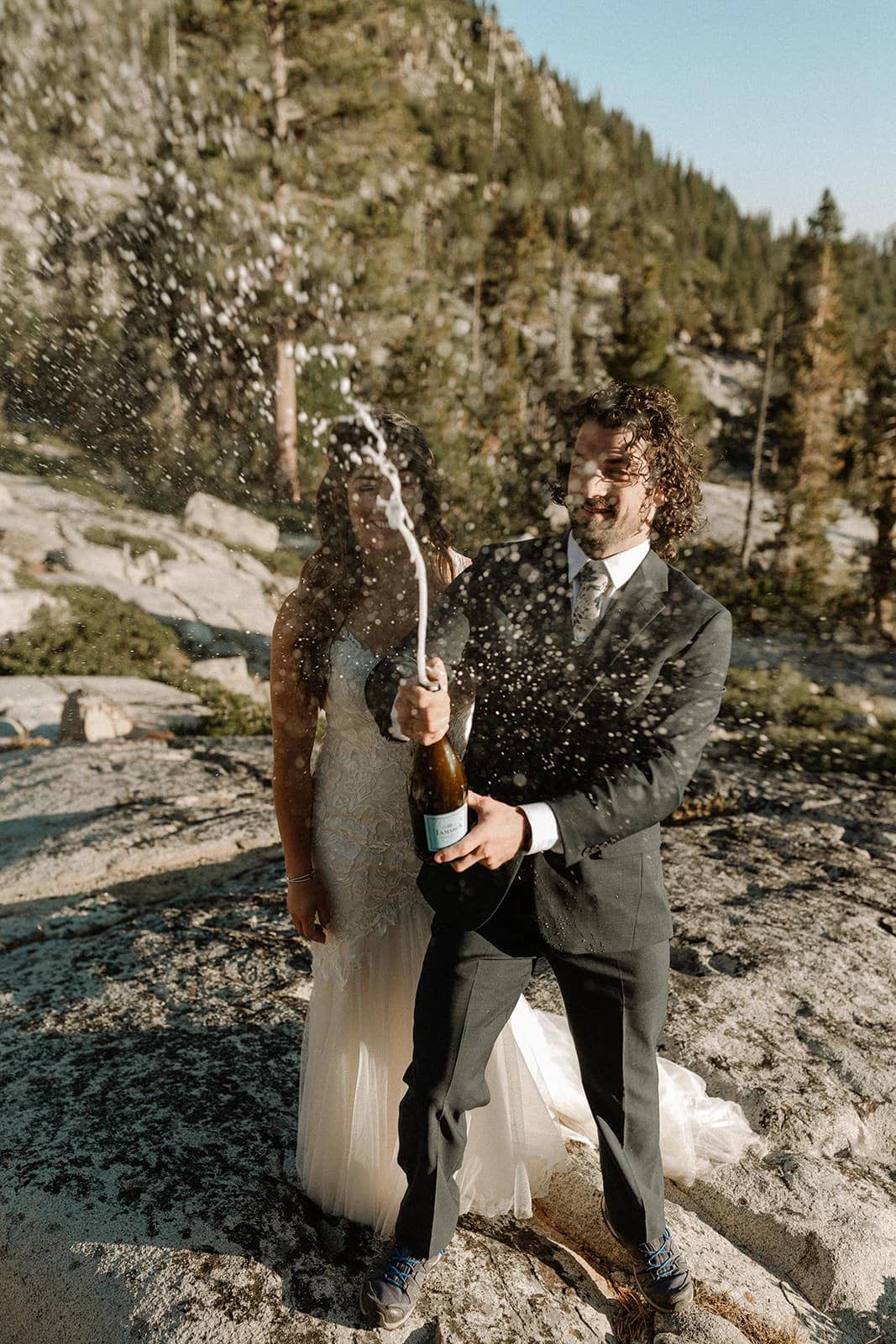 groom pops bottle at lake tahoe