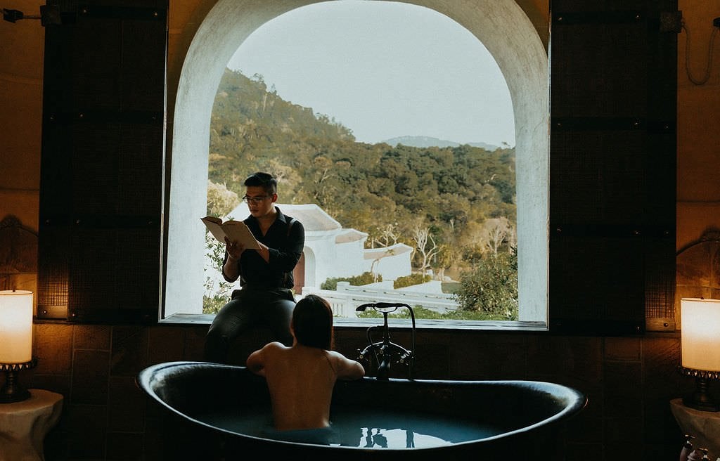 groom reading to his bride