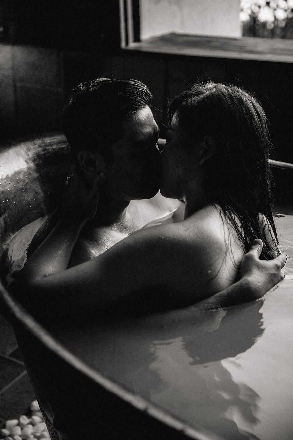 bride and groom kiss.