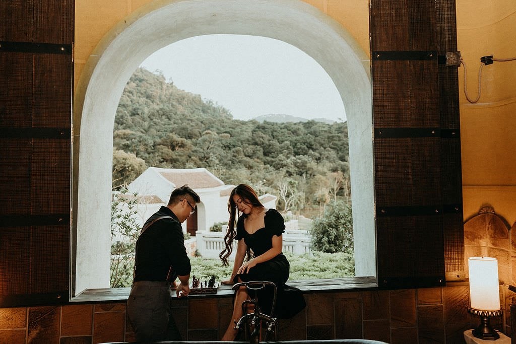 bride and groom playing chess.