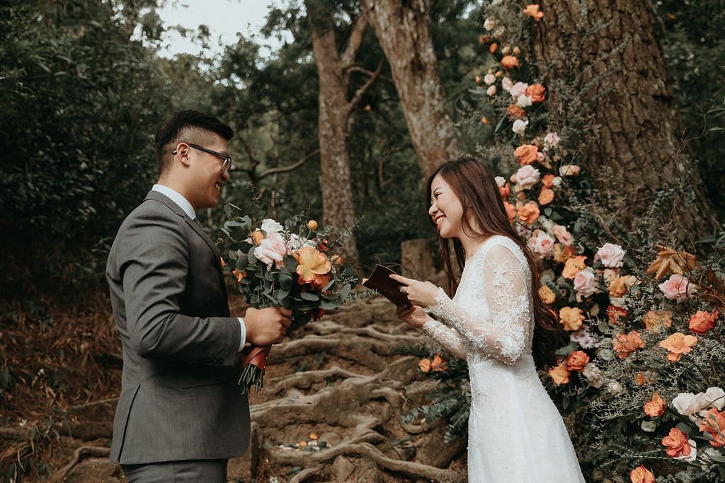 bride reads vows to groom.