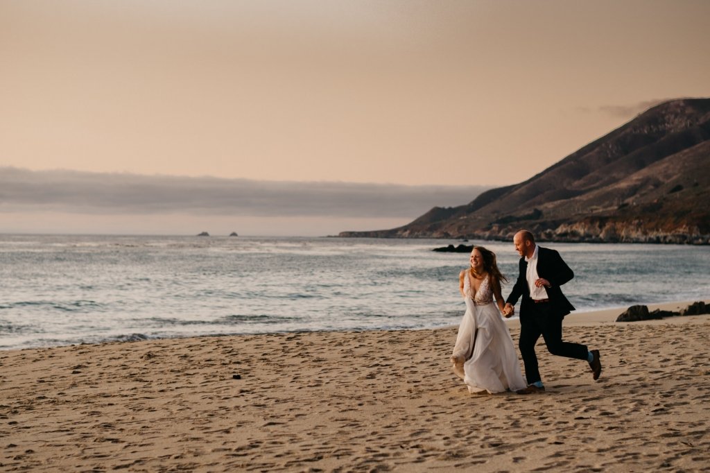 couple running on beach