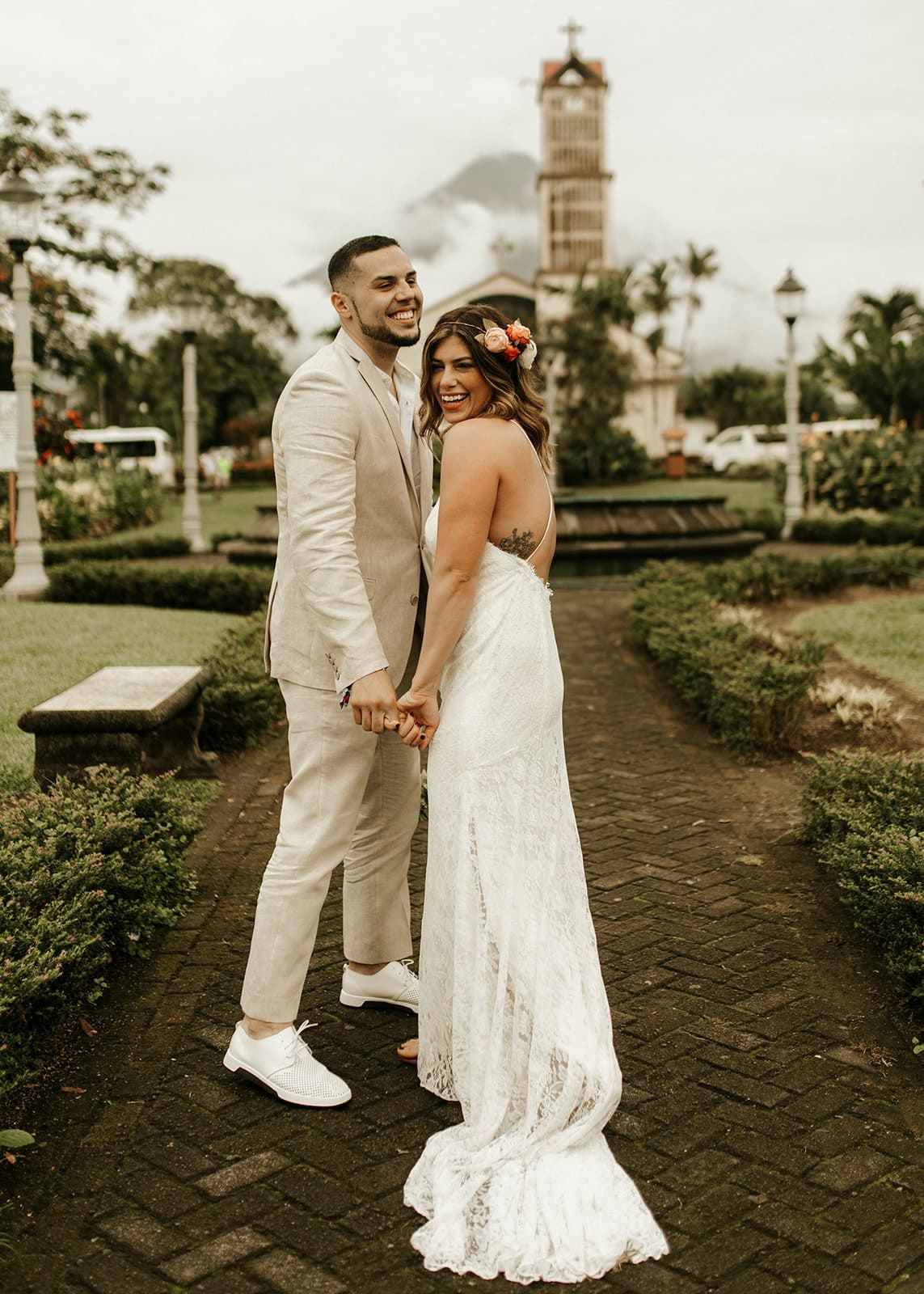 bride and groom at park