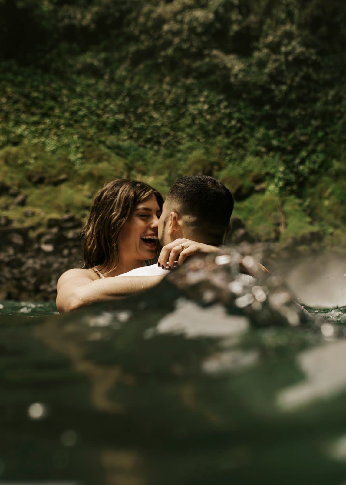 Jamie & Joey bride and groom in waterfall