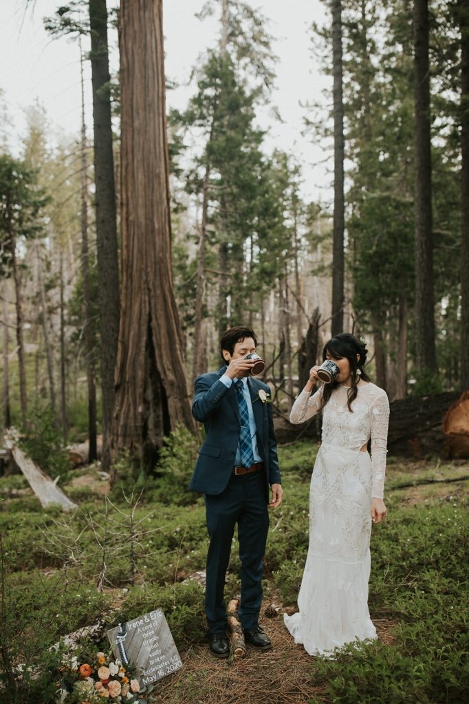 couple drinking cider for wedding