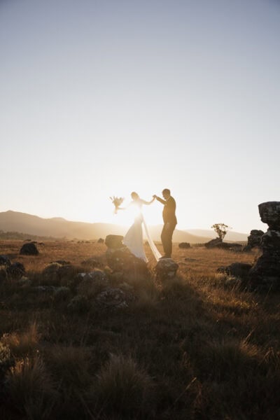 Romantic sunset portrait on the Blyde River Canyon escarpment, captured during a helicopter elopement near Hoedspruit.