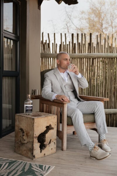 Bride preparing for his safari elopement in a luxury bush suite at Klaserie Drift in the Greater Kruger area.